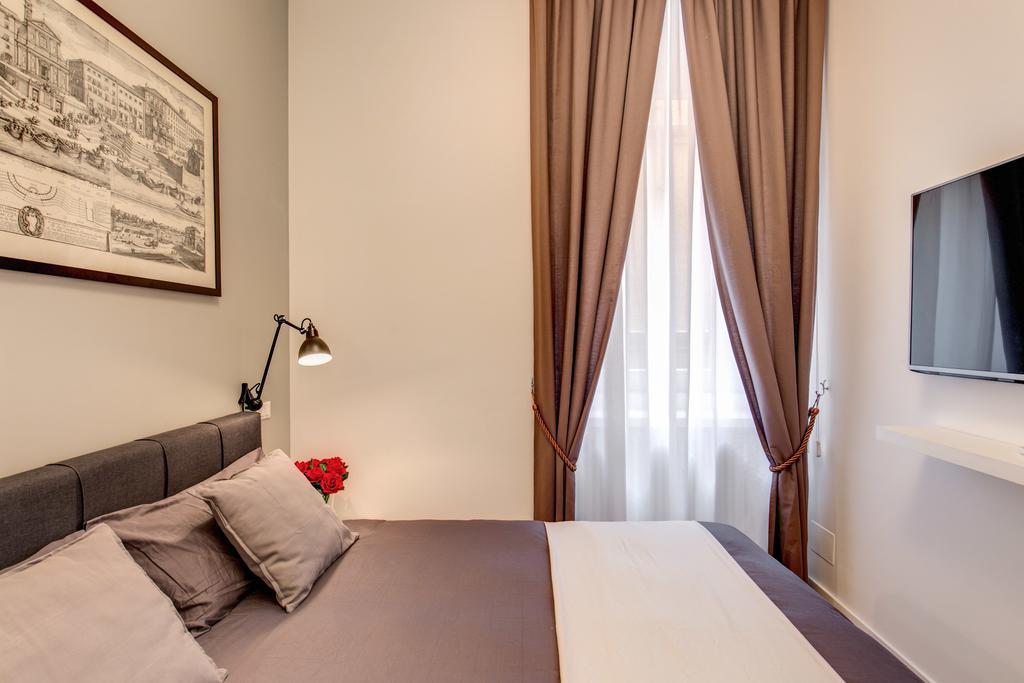 Orange Suites Roma Habitación foto